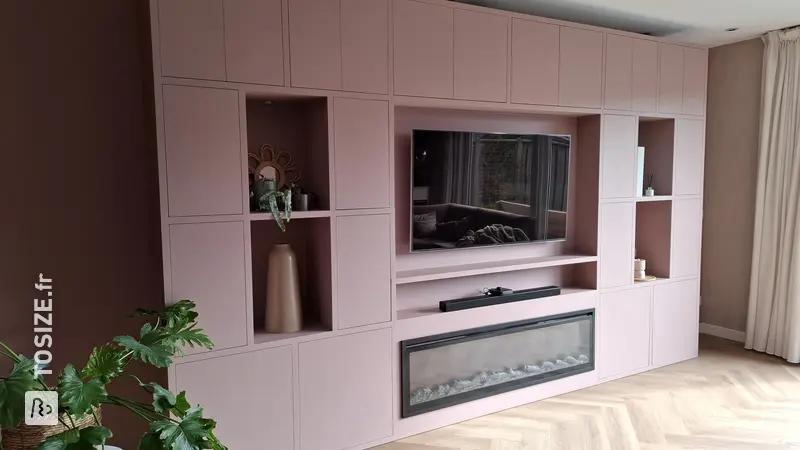 Large TV cabinet with cinewall and fireplace, by Nynke