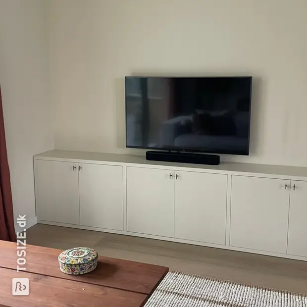 White sideboard with doors and open compartments