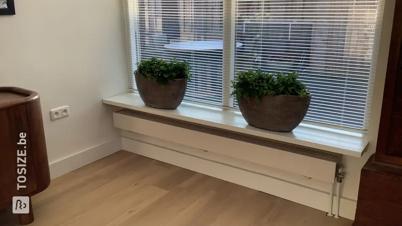 Stylish windowsill and radiator cover in the living room, by Rien