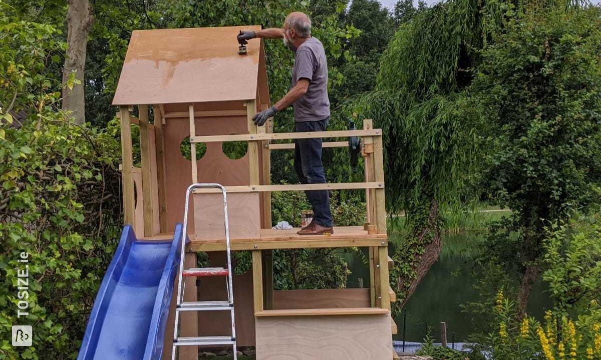 A play/climbing house made of plywood, by Gert