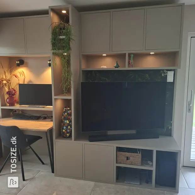 Grey wall unit with open compartments and doors