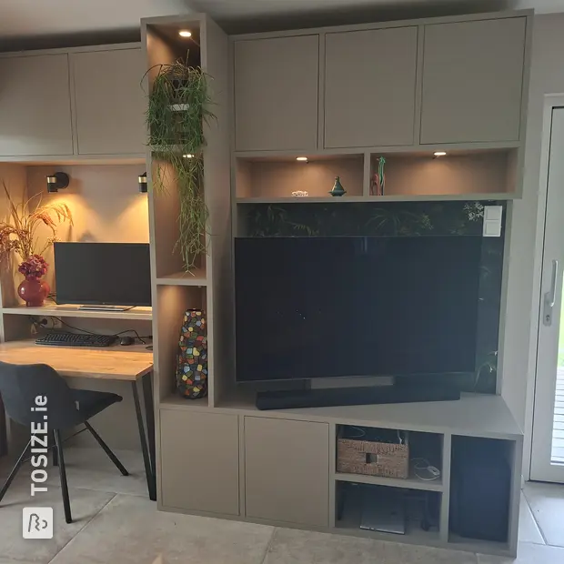 Grey wall unit with open compartments and doors