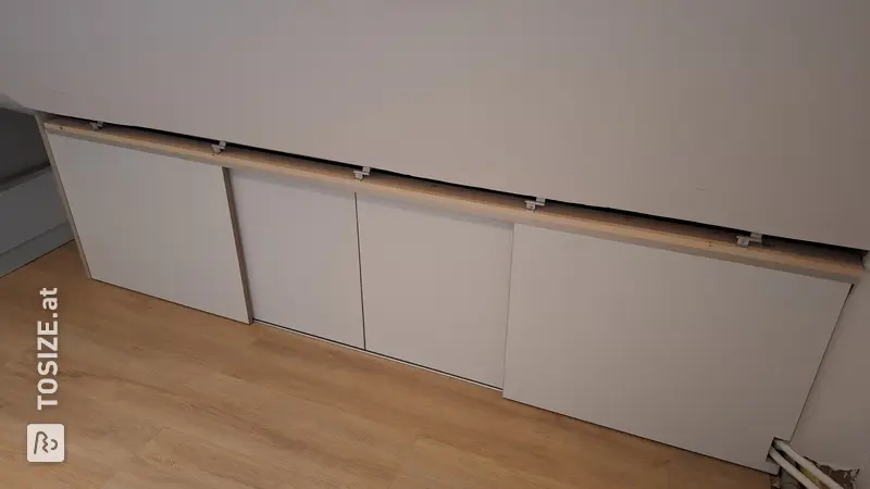 Maximaler Stauraum mit Schiebetüren im Dachgeschoss, von Youri