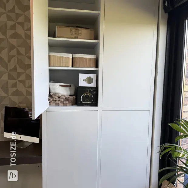 White sideboard with doors and shelves