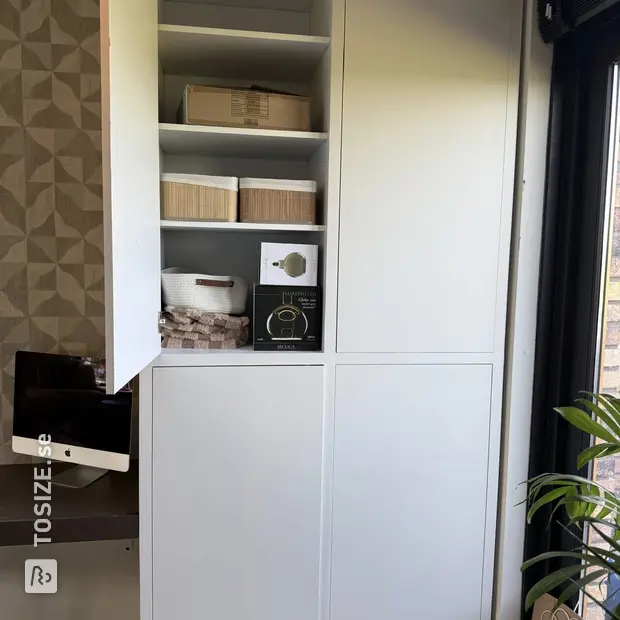 White sideboard with doors and shelves