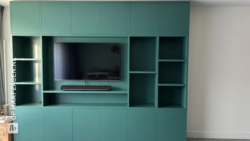Custom-made wall cabinet in mangrove green, by Lars