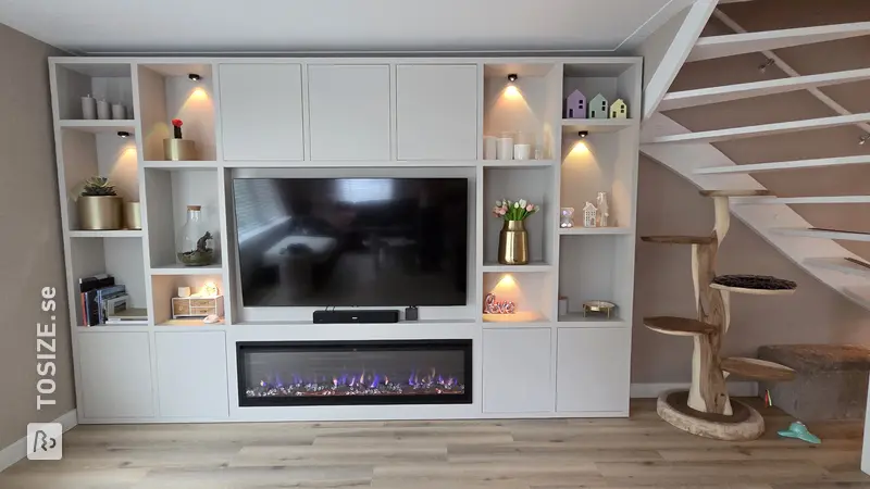 Stylish Cinewall cabinet with TV and Fireplace, by Wendy