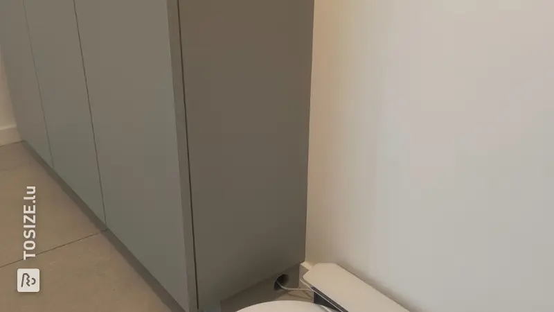 Integrated technology cabinet made of lacquered MDF, by Stijn