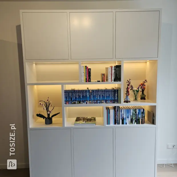 White bookcase with open compartments and doors