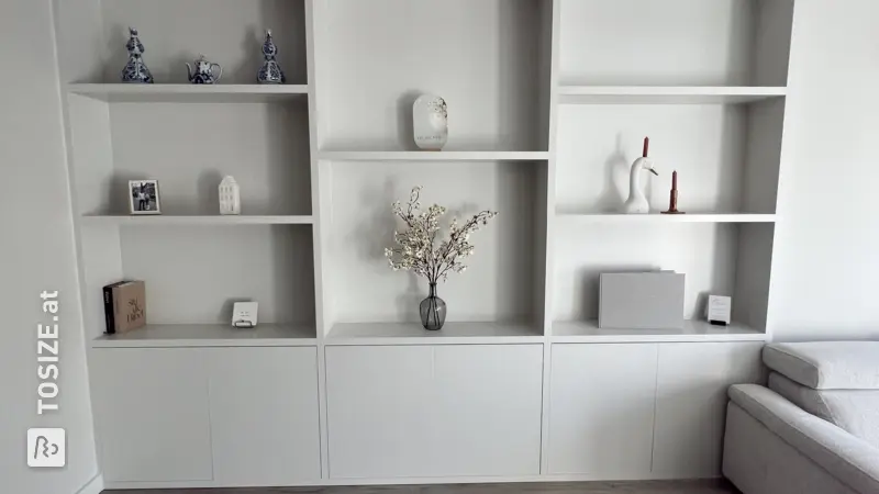 Custom-made built-in wardrobe for the living room, by Arjan