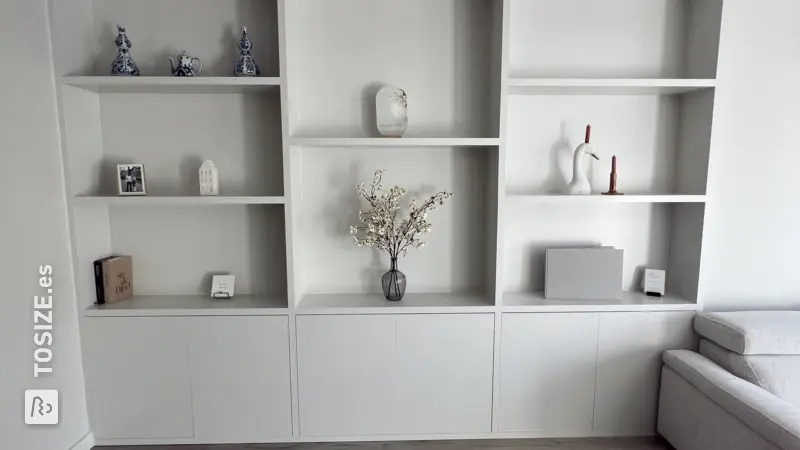 Custom-made built-in wardrobe for the living room, by Arjan