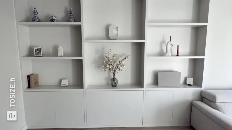 Custom-made built-in wardrobe for the living room, by Arjan