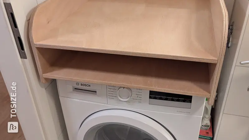 Praktischer Wickelaufsatz für die Waschmaschine, durch Robert
