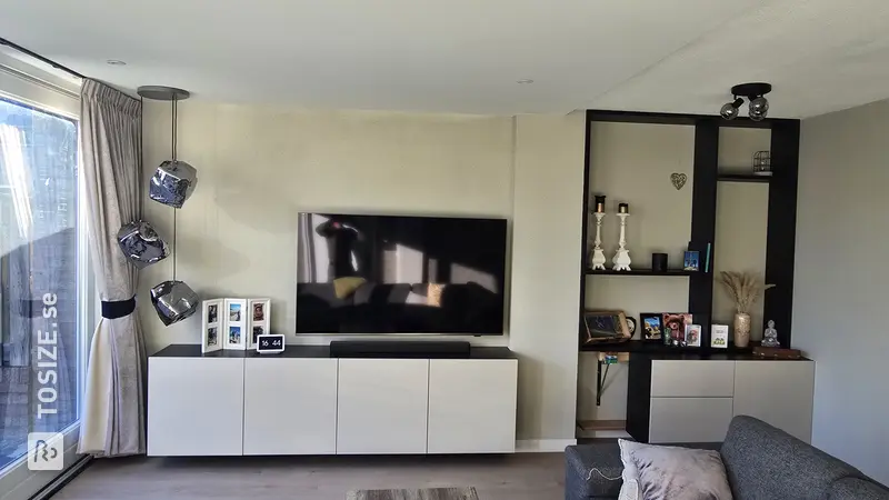 Stylish custom-made shelving unit surround without back panel, by Ivo