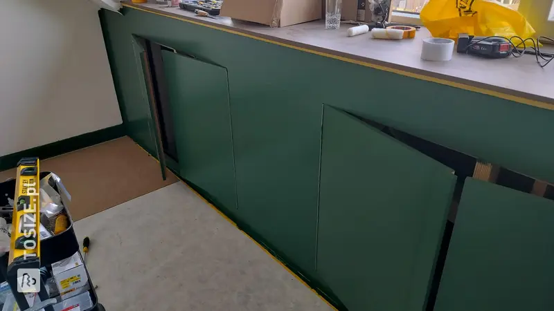 Knee-wall cupboard unit under dormer in the attic, by Menno