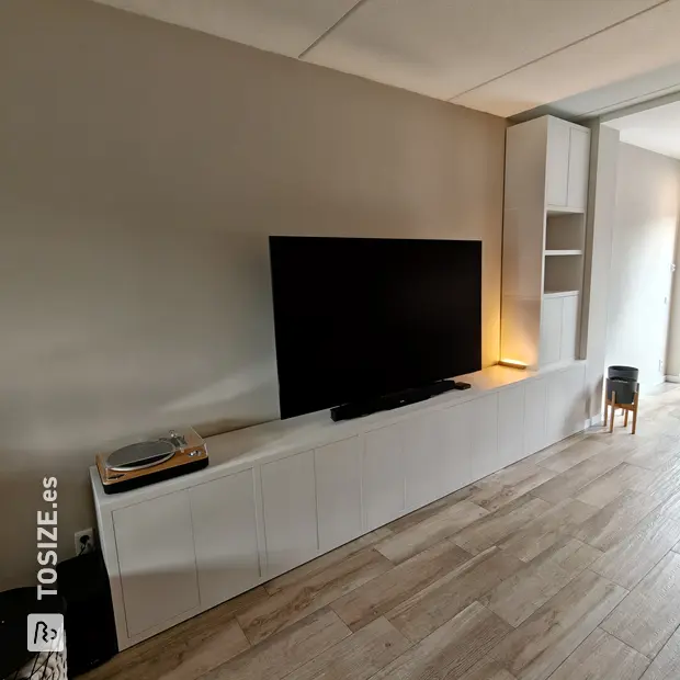 White cabinet with open compartments and doors