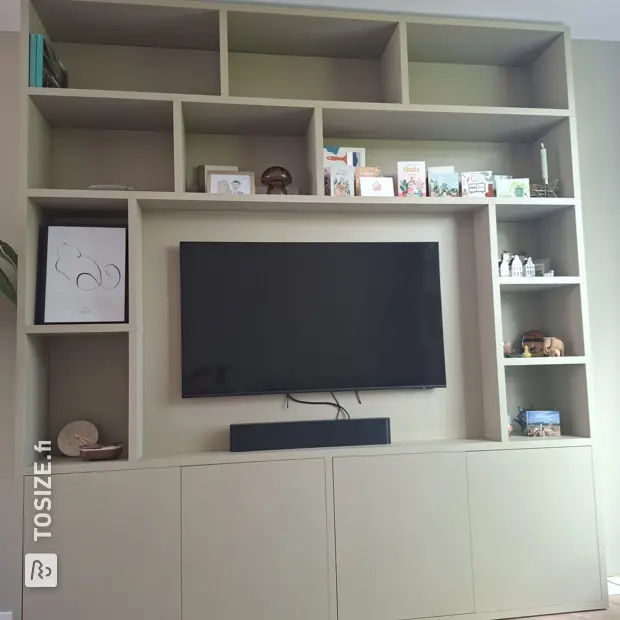 Cream cabinet with open compartments and doors