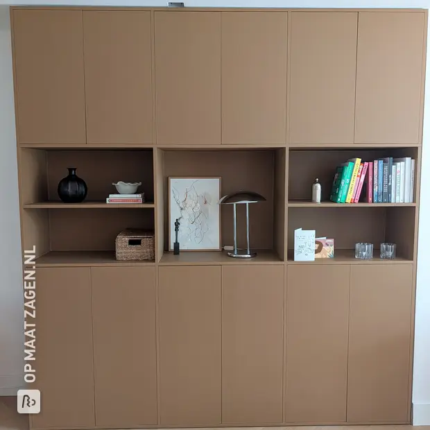 Brown cabinet with doors and open compartments
