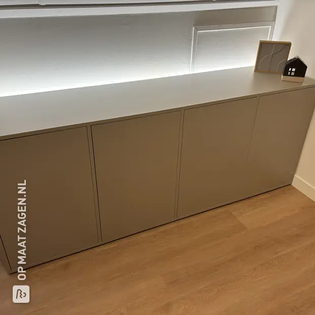 Beige sideboard with doors and shelves
