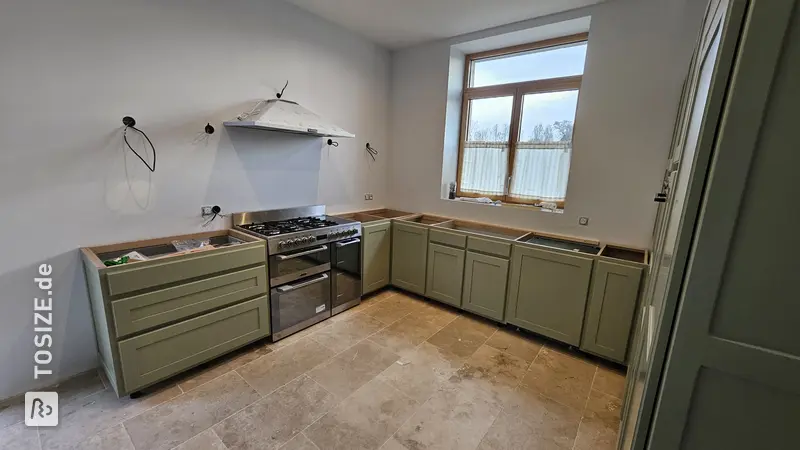Kitchen cabinet door made of panels, by Laurie