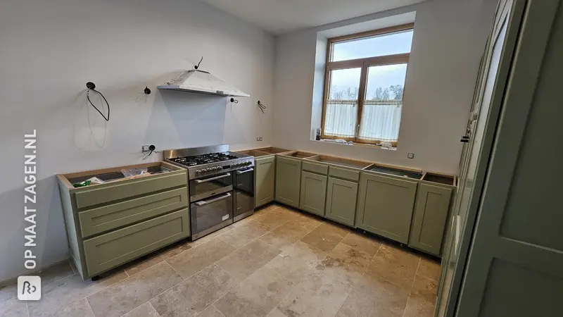 Kitchen cabinet door made of panels, by Laurie