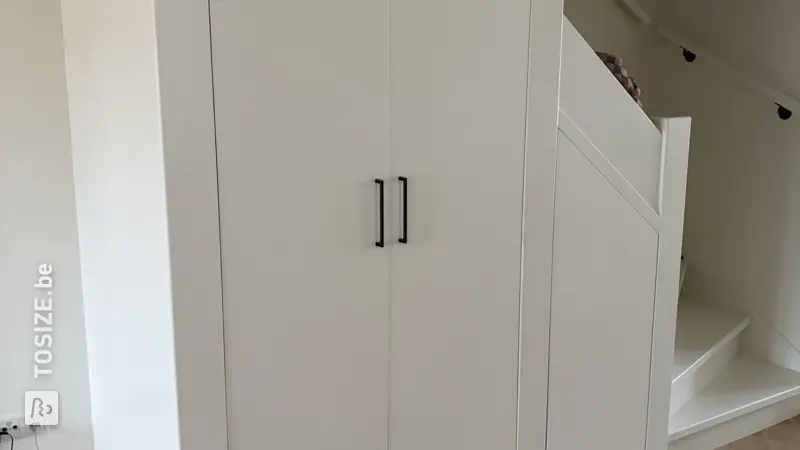 Smart under-stair cupboard for the living room, by Wies