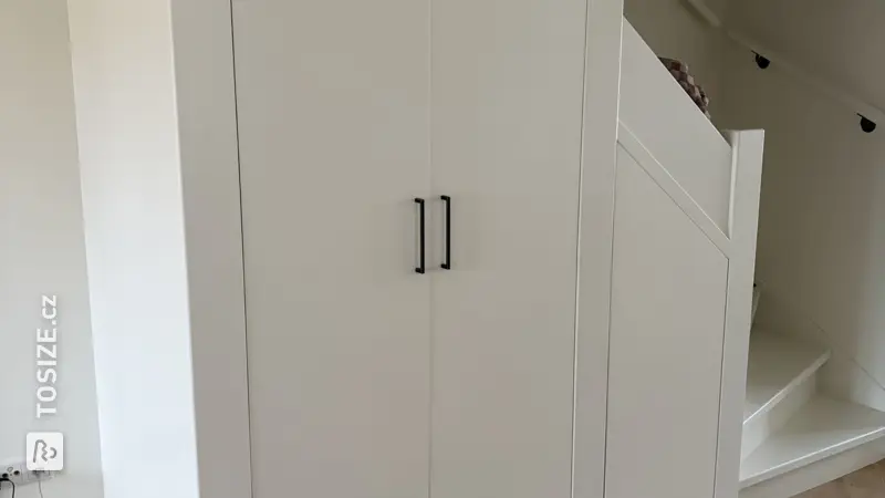Smart under-stair cupboard for the living room, by Wies