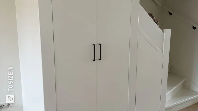 Smart under-stair cupboard for the living room, by Wies