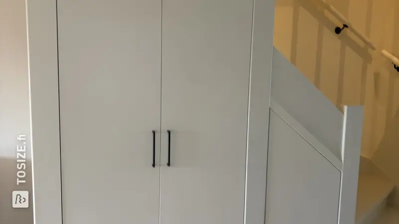Smart under-stair cupboard for the living room, by Wies