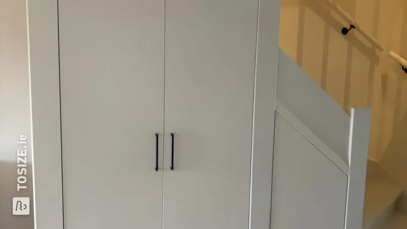 Smart under-stair cupboard for the living room, by Wies