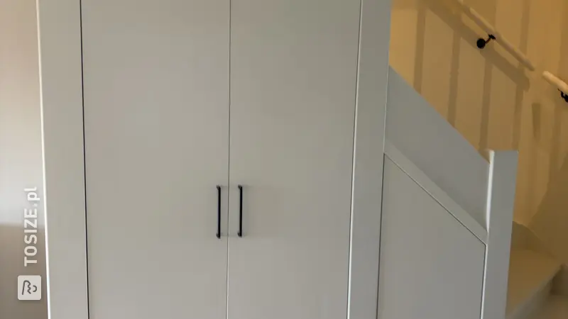 Smart under-stair cupboard for the living room, by Wies