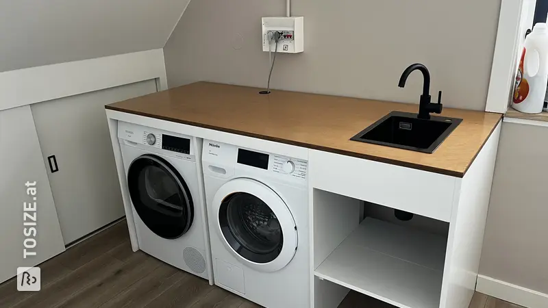 Stylish Washing Machine Enclosure in the Attic, by Bastiaan
