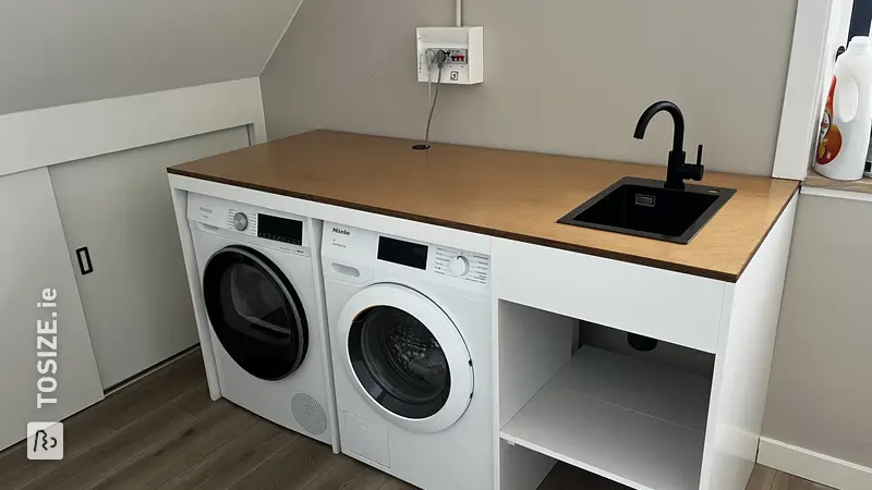 Stylish Washing Machine Enclosure in the Attic, by Bastiaan