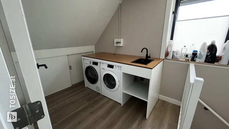 Stylish Washing Machine Enclosure in the Attic, by Bastiaan