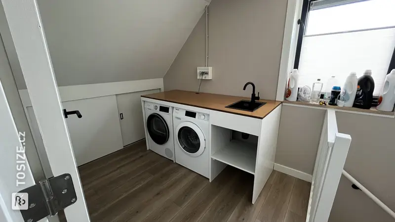 Stylish Washing Machine Enclosure in the Attic, by Bastiaan