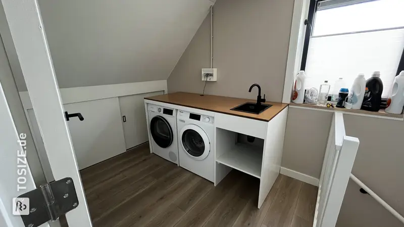 Stylish Washing Machine Enclosure in the Attic, by Bastiaan