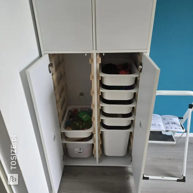 White shoe cabinet with doors and open compartments