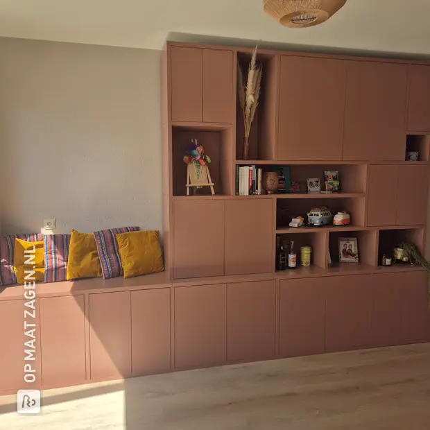 Red cabinet with doors and open compartments