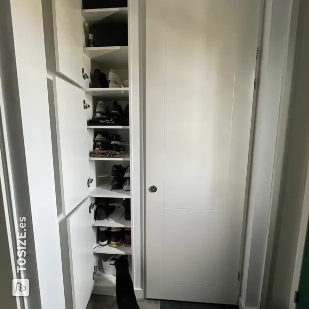 White shoe cabinet with doors and open compartments