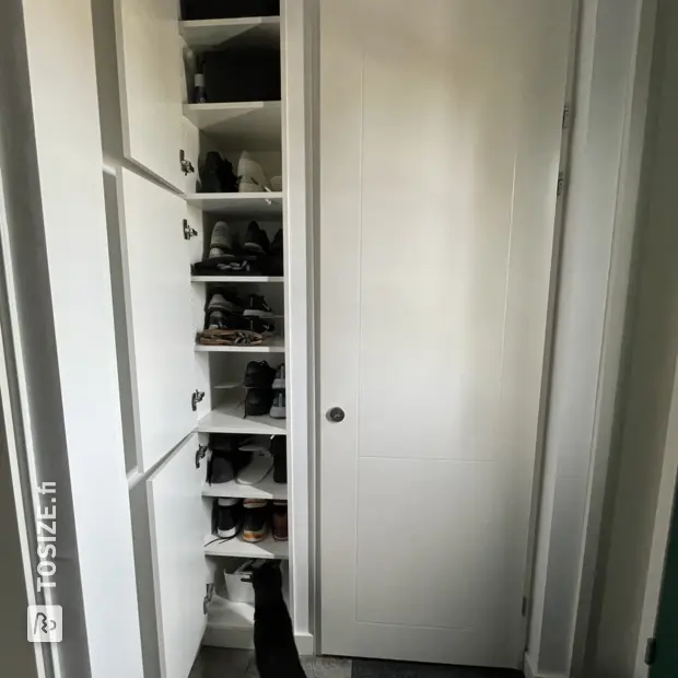 White shoe cabinet with doors and open compartments