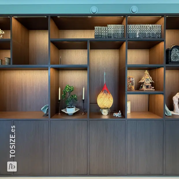 Dark wooden wall unit with open compartments and doors
