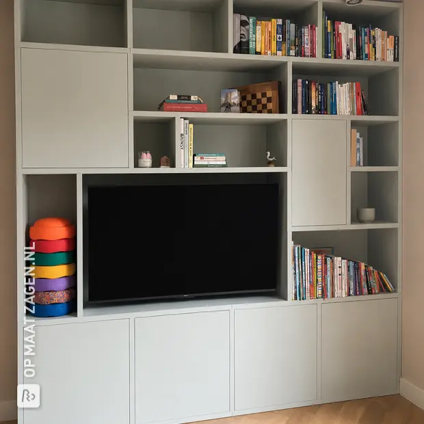 Grey wall unit with doors and open compartments