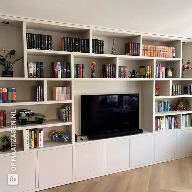 White bookcase with open compartments and doors