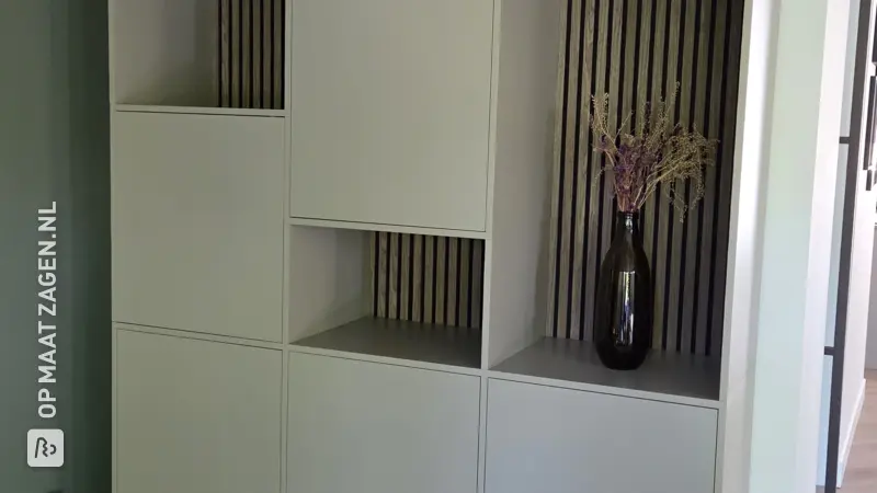 Stylish Games Cabinet with Acoustic Panel in the Living Room, by Maaike
