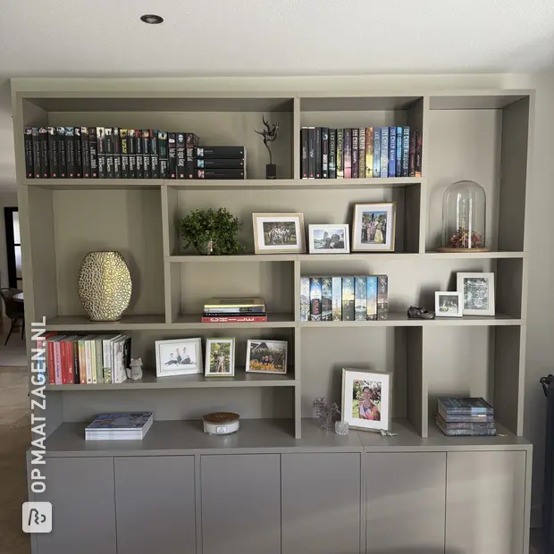 Grey cabinet with open compartments and doors
