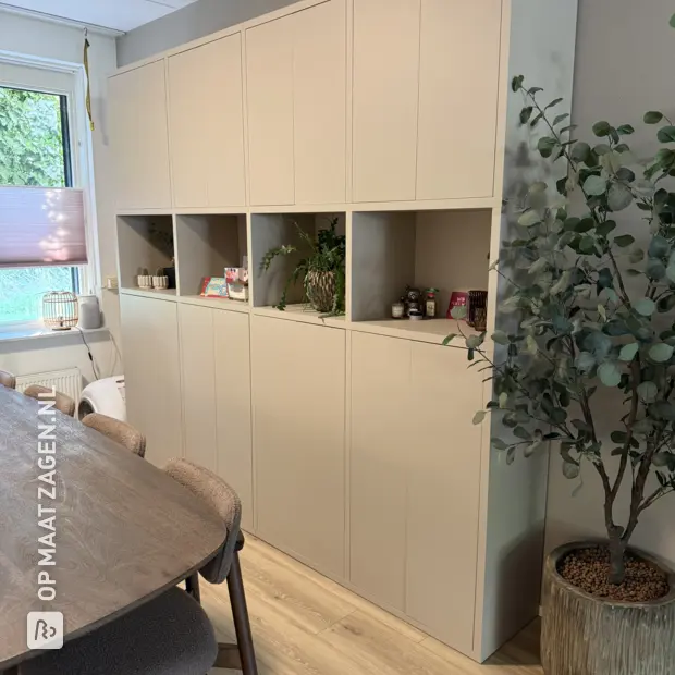 Cream wall unit with doors and open compartments