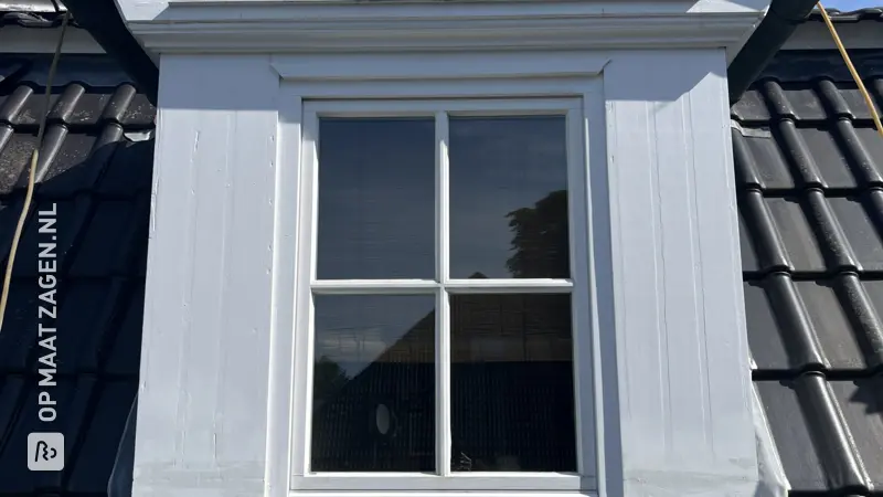 White dormer window - wood renewed, by Torsten
