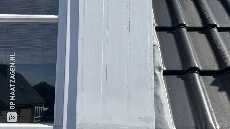 White dormer window - wood renewed, by Torsten