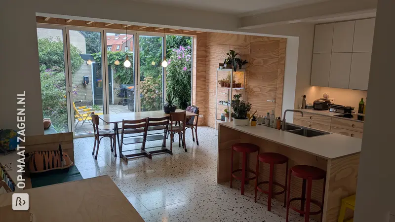 Custom-made living space with kitchen and workspace, by Tom