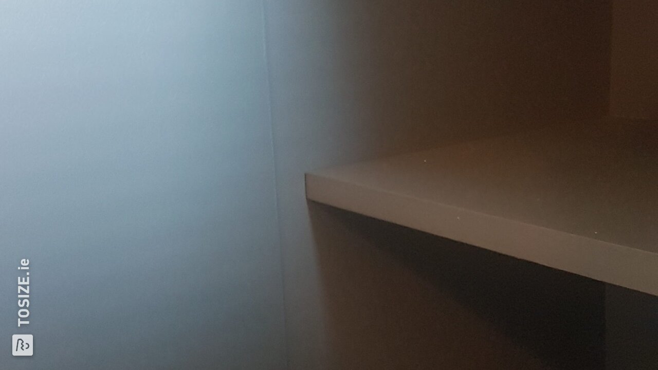 Blue MDF cabinet, by Erik